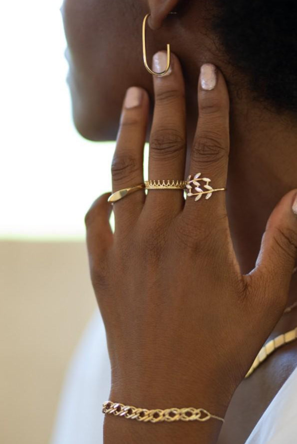 Crown Pledge 14k gold crown ring worn stacked with the Quiet Band 14k gold band