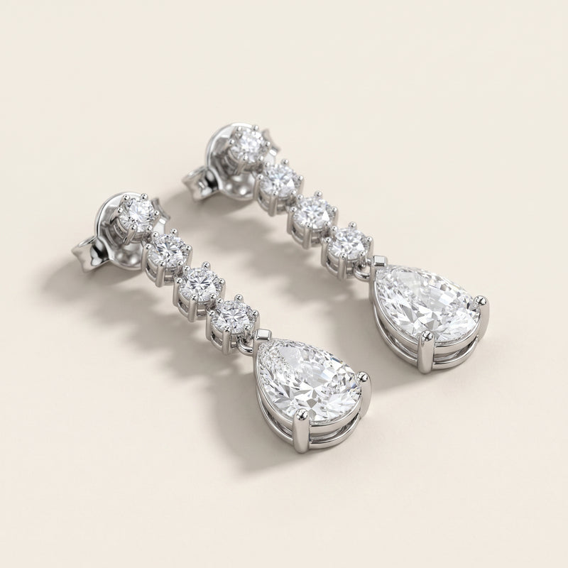 graduated pear drops, white gold