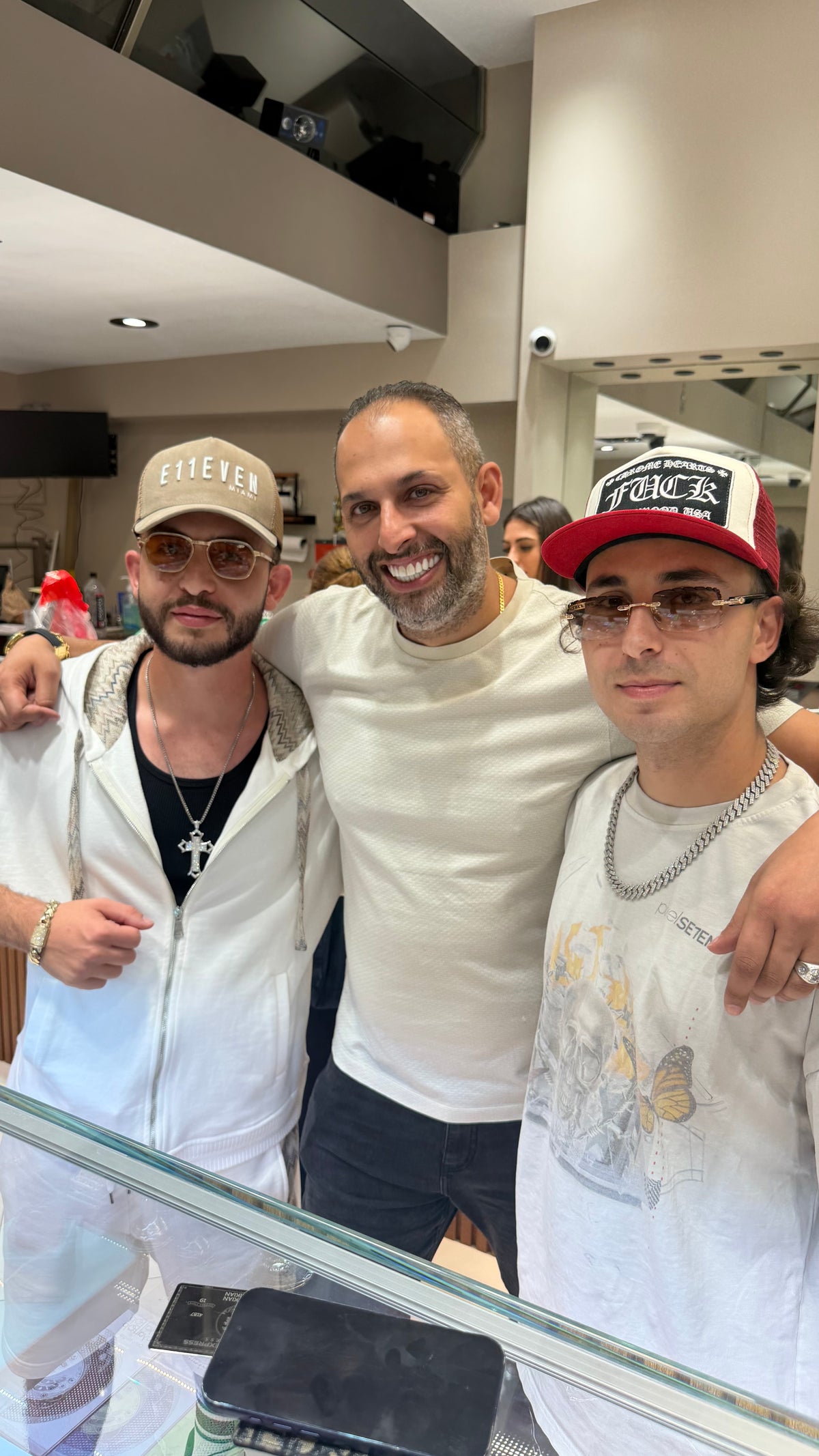Benny with two customers at the Mazalito counter, 76 W 47th Street